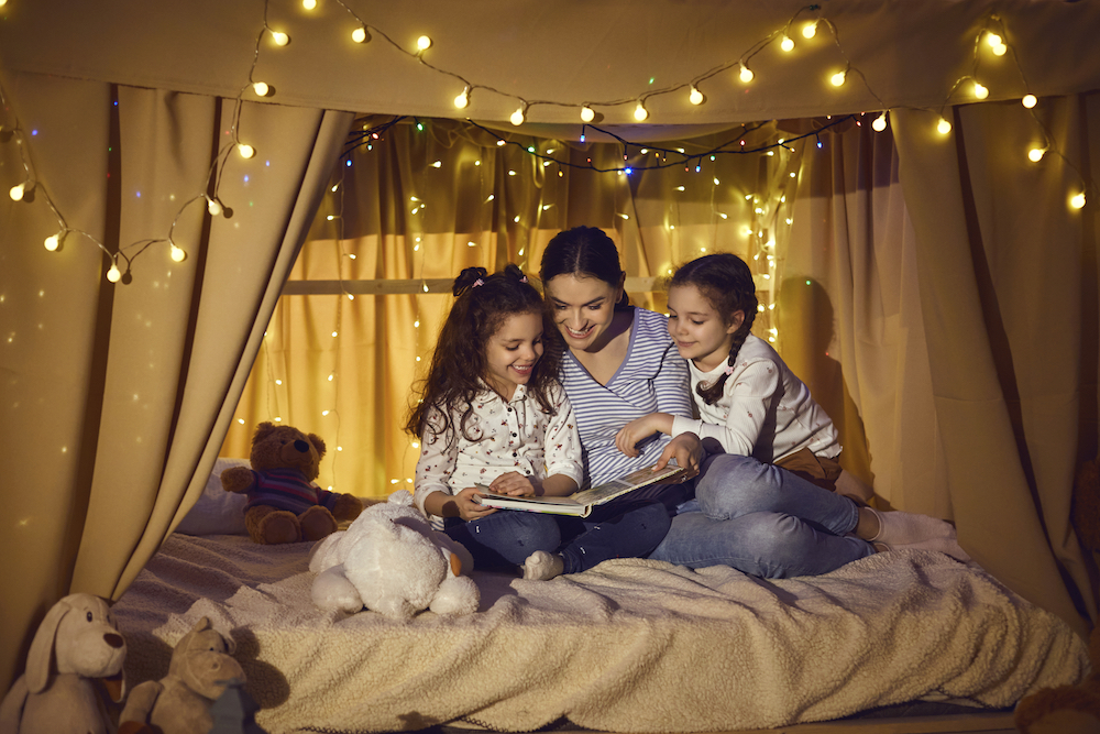 happy family reading a book